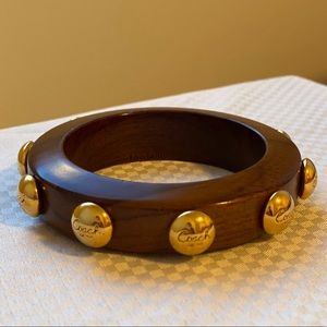 2/30 🛍 Coach Gold Wooden Rivet Bangle